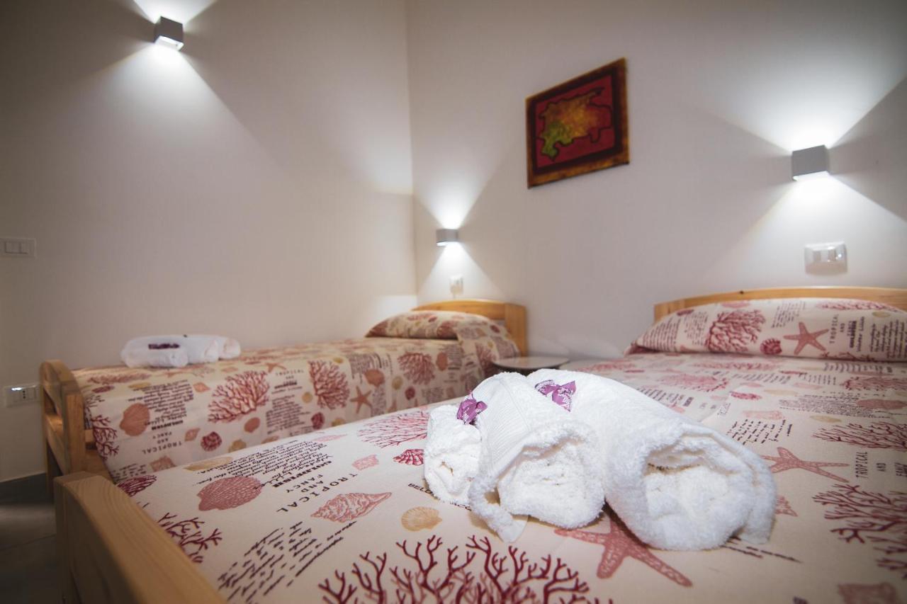 La Terra Del Benessere Castelsardo Bagian luar foto